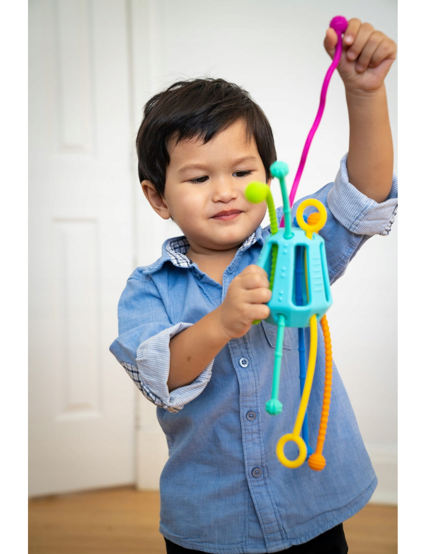 Fat Brain Toys Zippee – Sensoryczna Zabawka z Silikonowymi Sznureczkami | Ecobobo Fat Brain Toys Zippee – Sensoryczna Zabawka z Silikonowymi Sznureczkami | Ecobobo