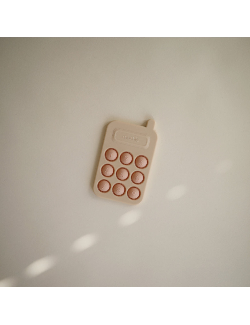 Zabawka sensoryczna Press Toy Phone, Blush Mushie Zabawka sensoryczna Press Toy Phone, Blush Mushie