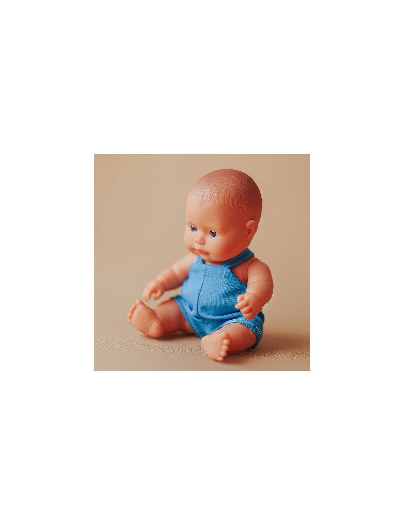 Miniland Lalka EUROPEJCZYK w niebieskim ubranku 21 cm