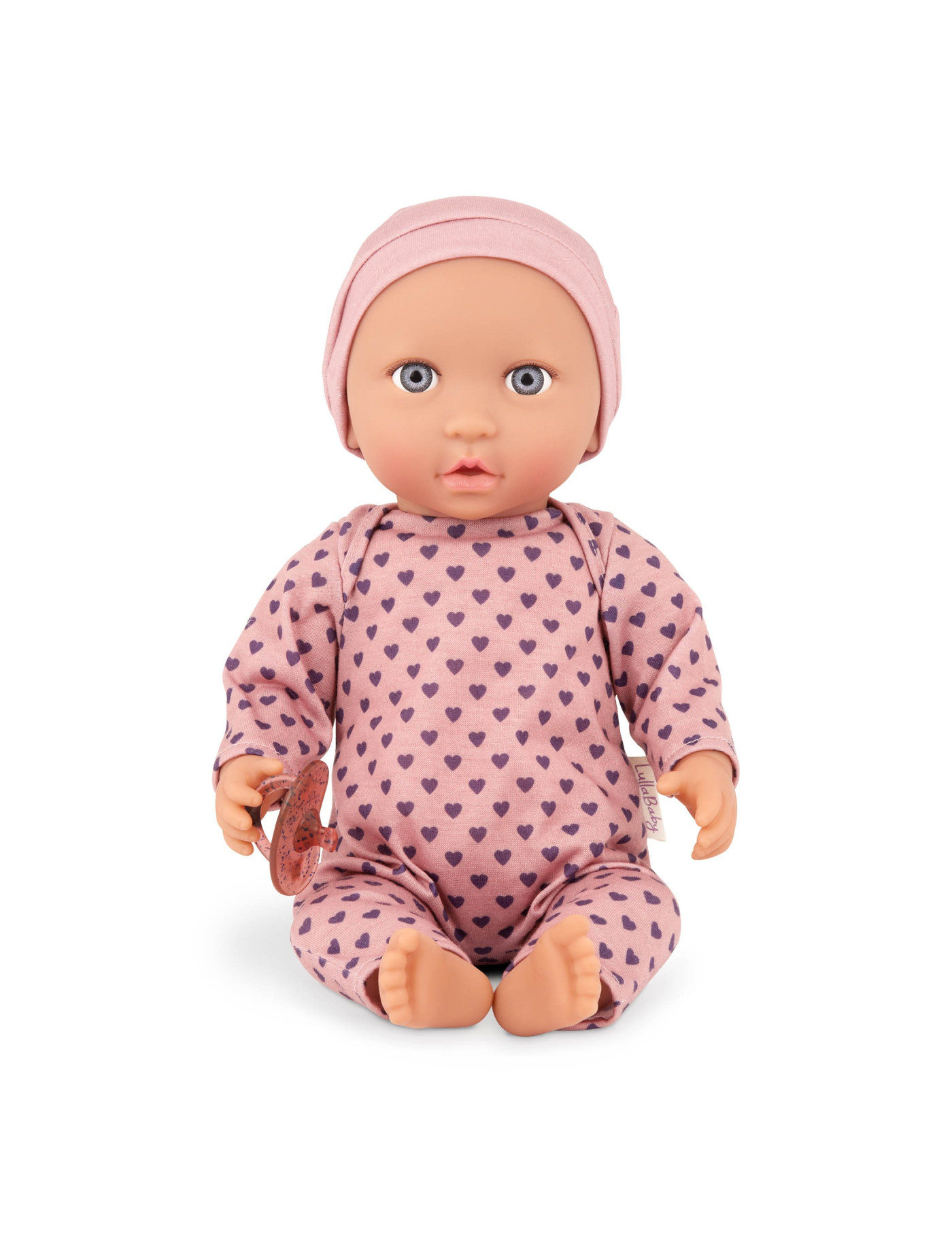 Lalka NIEMOWLĘ ze smoczkiem, w pidżamce w serduszka i czapeczce LullaBaby